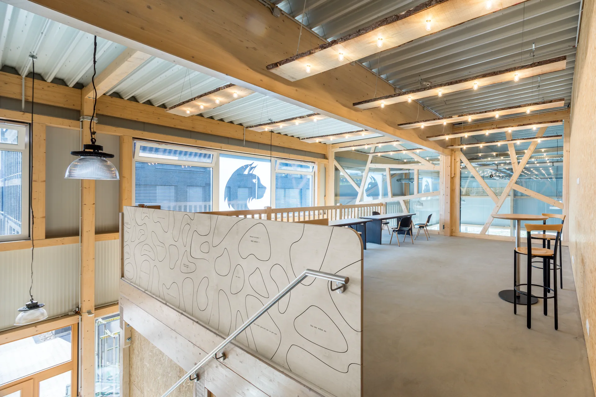 Timber gallery and staff area above the hall floor